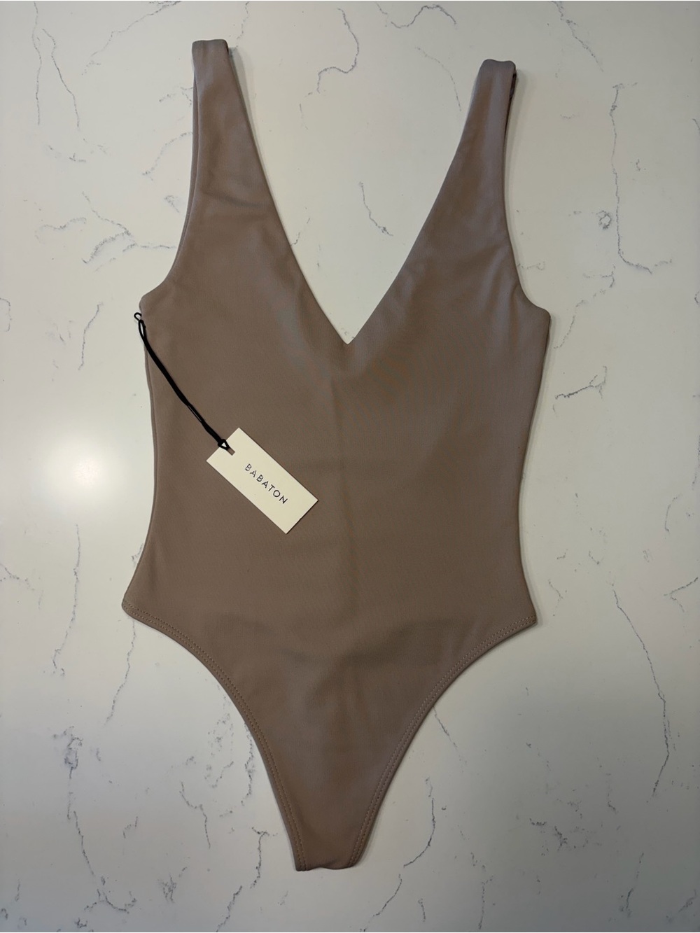 Babaton Taupe V‑Neck One‑Piece Bodysuit